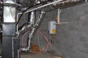 Basement Plumbing And HVAC Tank-less Water Heater