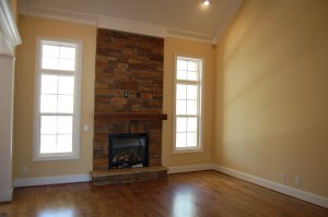 Family Room Stone Fireplace Vaulted Ceiling