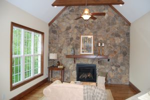 Vaulted Keeping Room Exposed Wood Beams Stone Accent Well With Direct Vent Fireplace